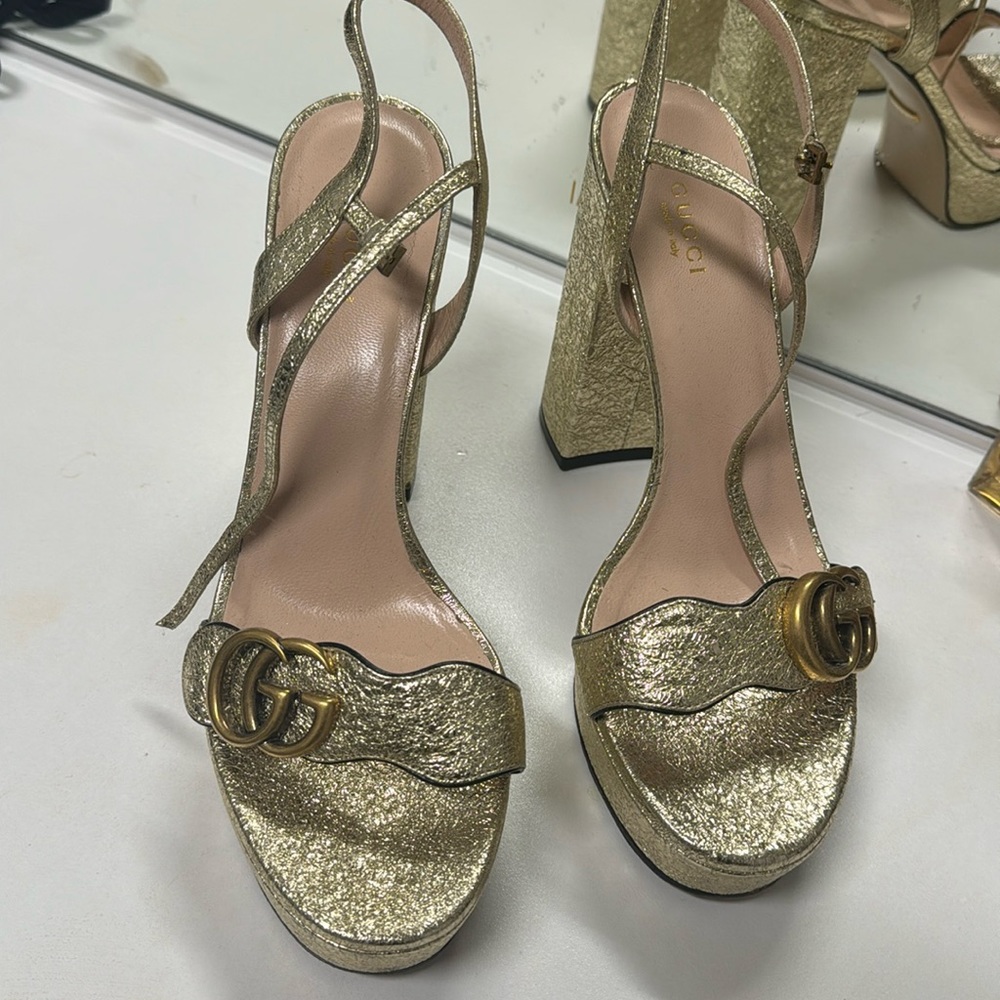 Gucci gold platform heels